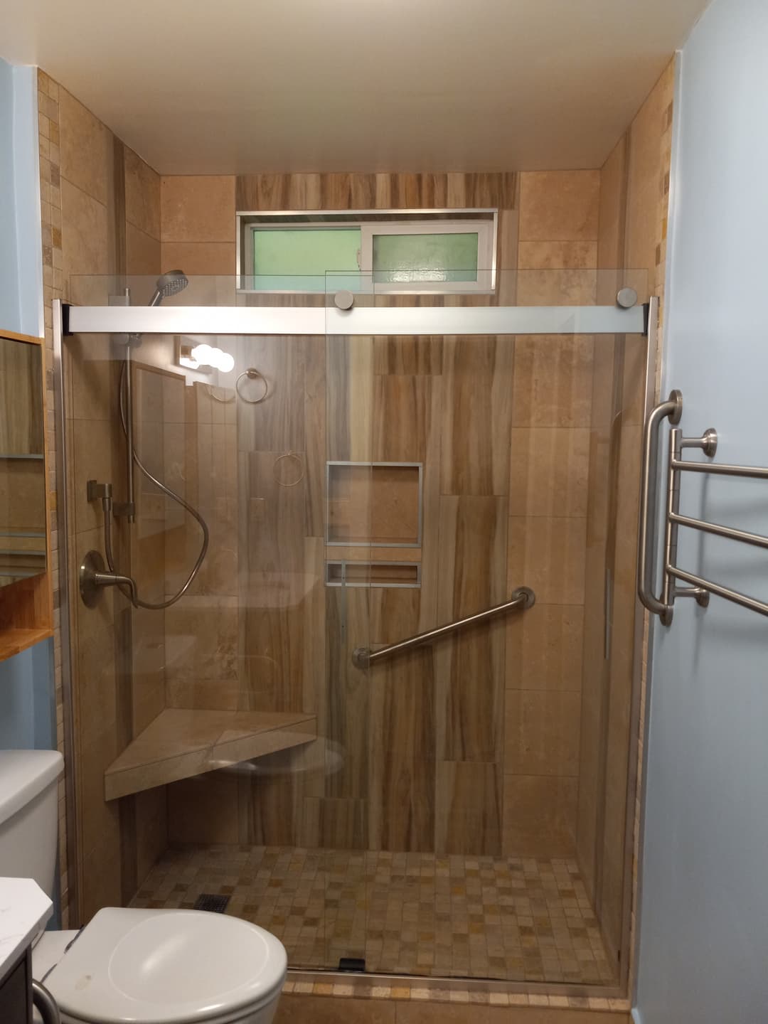 picture of a bathroom and shower with custom wood tiles and wood backsplash done in portland oregon